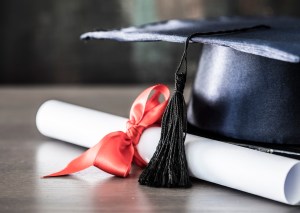 diploma and grad cap
