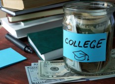 college money in jar by books