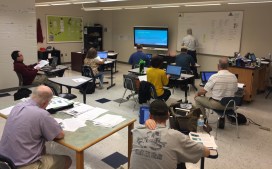 students learning computer science in a classroom