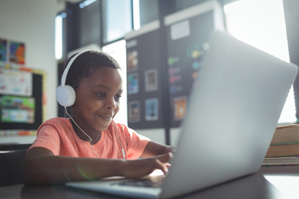 kid using laptop