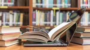 laptop and books