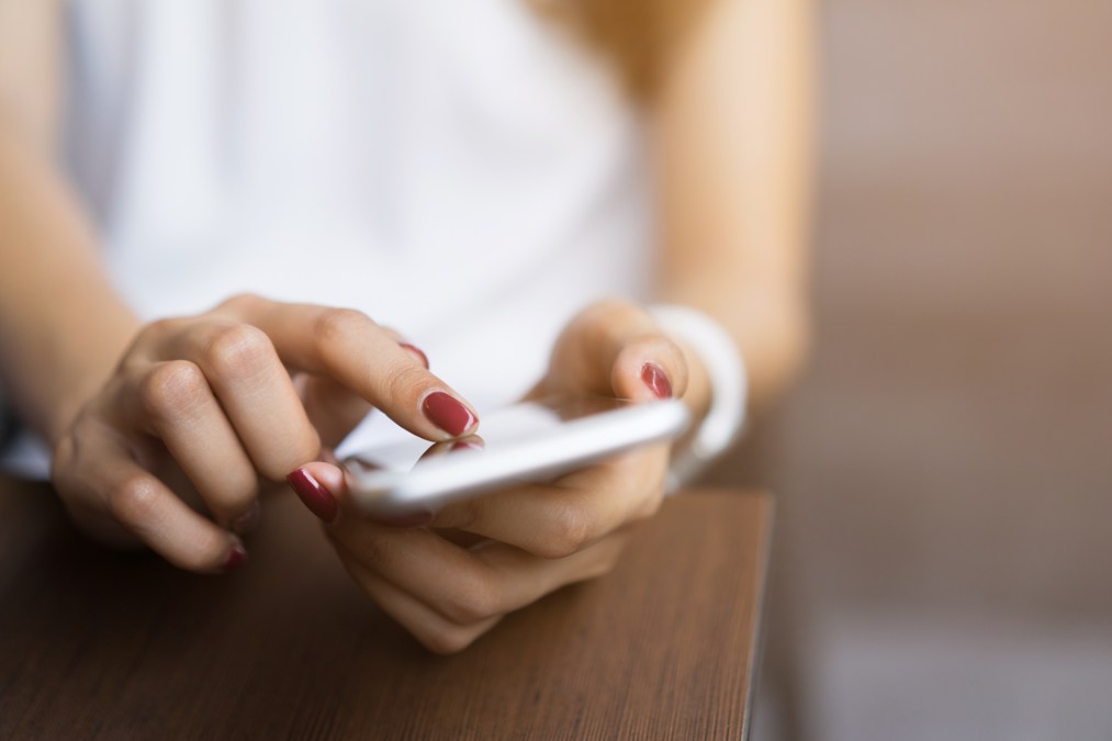 woman using smartphone