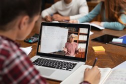 teacher on video chat with student