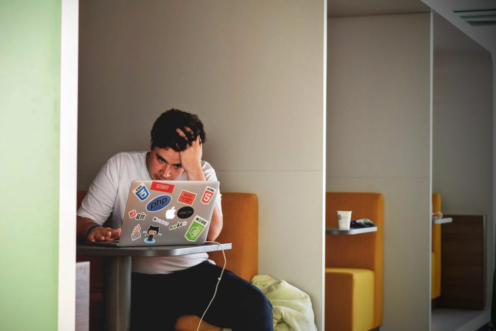 guy studying on laptop