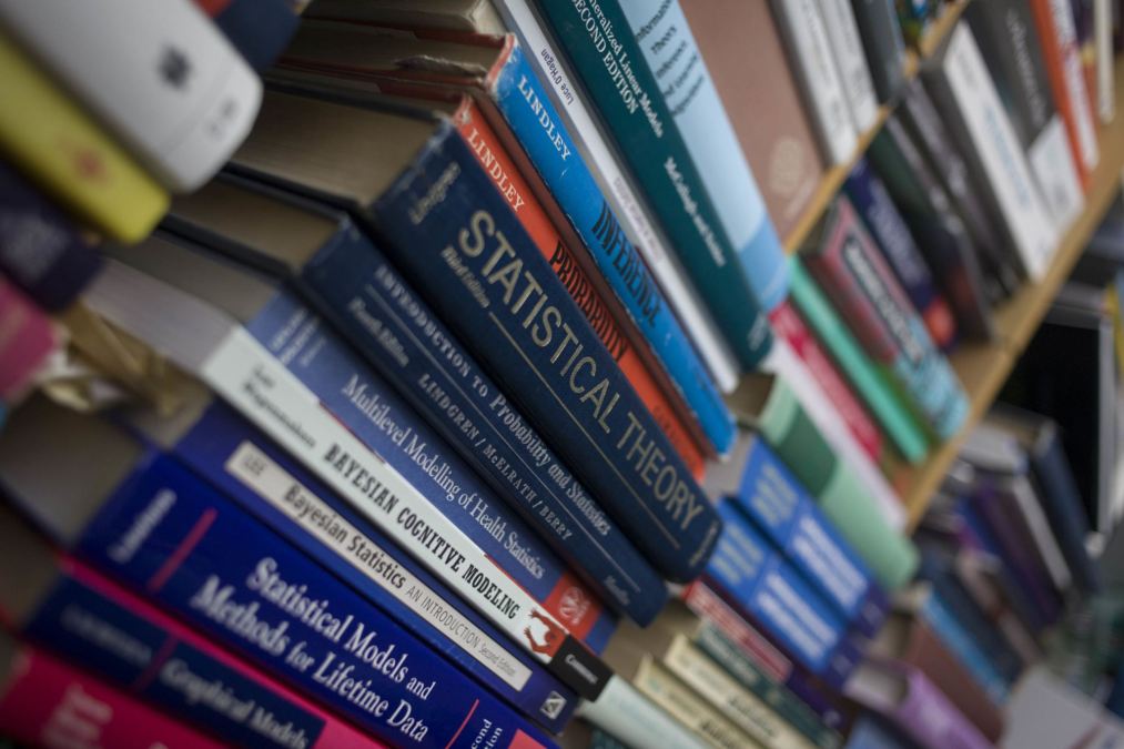 textbooks on a shelf