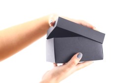 hands opening box